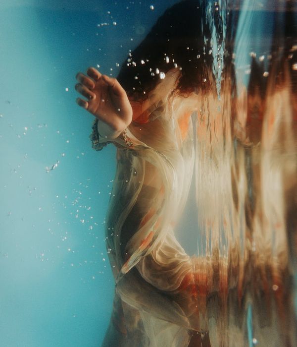 Woman in a fluid motion pose representing gentle cardio.